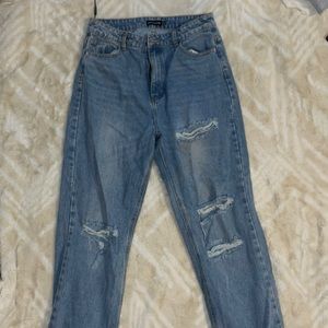 Pretty little things slightly ripped mom jeans